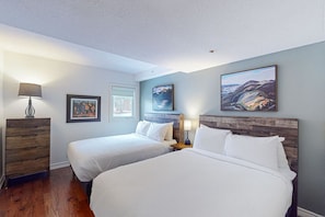 A hotel room with two beds, a wooden dresser, and artwork on the walls. - Spacious Mountain Walk Home, Steps to Blue! (The Blue Mountains)