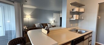 Lakefront Getaway - 2 Balconies, Pool & Hot Tub - Walk to Jet Express!