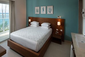 Room - Beachfront Studio Suite | Cabarete, DR | Pools + Dining (Cabarete)