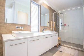 Shower, hair dryer, shampoo