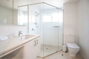 Shower, hair dryer, shampoo