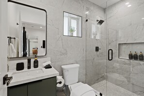 Shower, hair dryer, towels, soap - Modern Highland Park Home with 3 Ensuite Bedrooms, Patio & BBQ (Los Angeles)