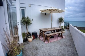 Outdoor dining - Modern 2BR Beach View Home - Sleeps 4 (Cornwall)