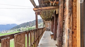 A wooden balcony with a view of a mountainous landscape. - La Seille - HAUTELUCE (HAUTELUCE)