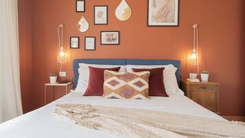 Tabla de planchar con plancha, wifi gratis y ropa de cama
