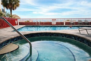 Outdoor pool, a heated pool - Upscale Beachfront Condo • Gulf View Balcony • Pool• Steps to Johns Pass &Dining (Madeira Beach)
