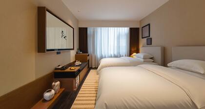 Wuye WOO YEAH Tangchi Hotel