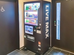A vending machine labeled 'LIVE MAX' with various drink options. - Hotel Livemax Yokohama Station West Exit (Yokohama)