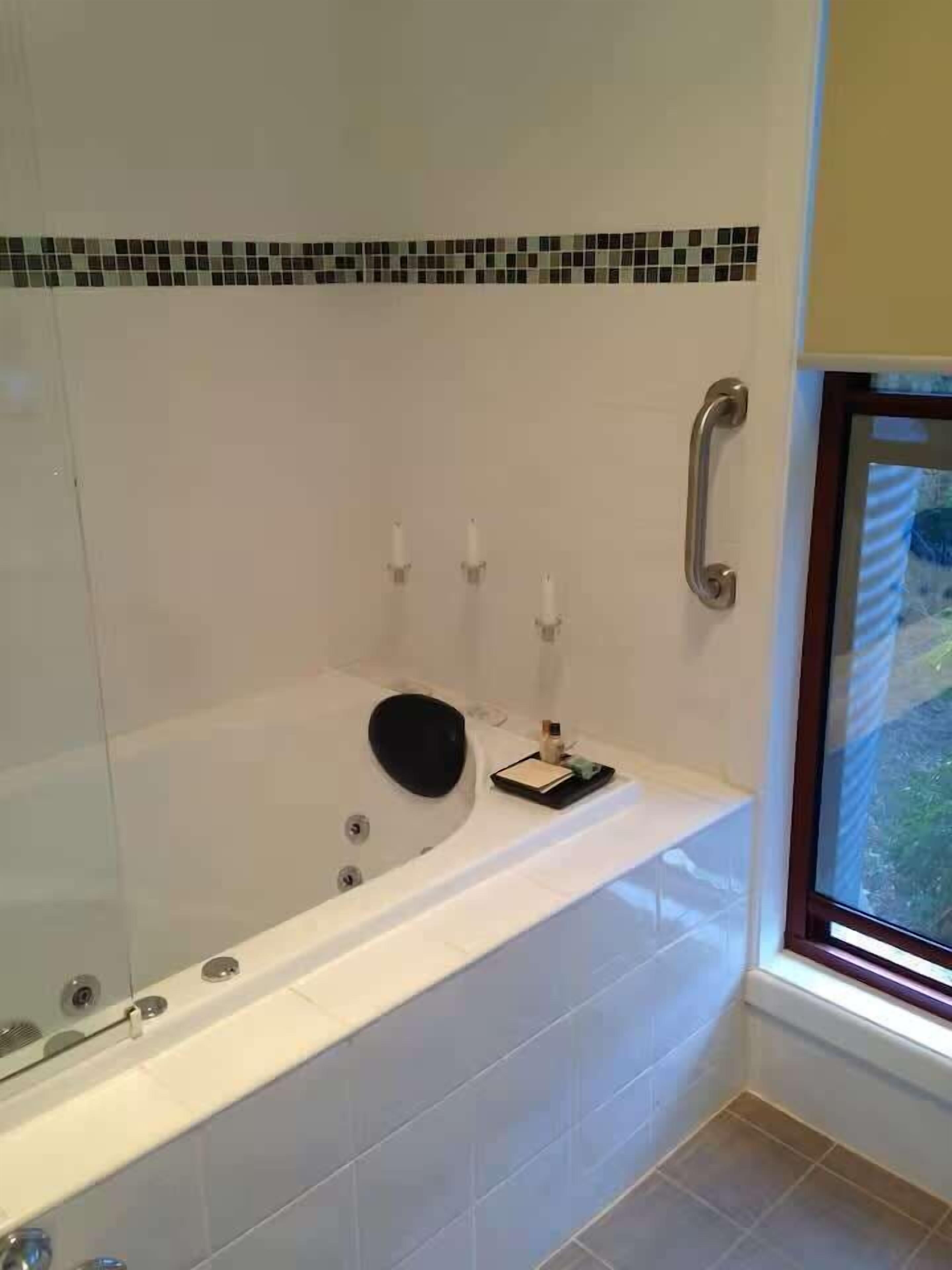 Shower, hair dryer, towels, shampoo