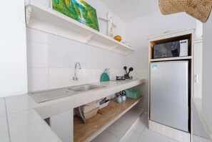 Comfort Villa, Private Pool, Pool View | Private kitchen | Dining tables - Gypsy Villa by Pertama Stay (Seminyak)