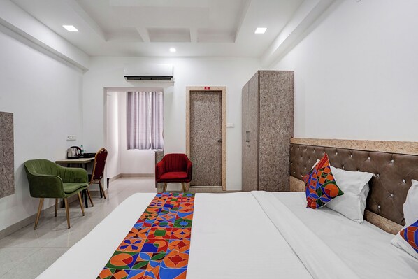 Egyptian cotton sheets, premium bedding, in-room safe, free WiFi - Fabhotel Prime Ij Suites (Bangalore)