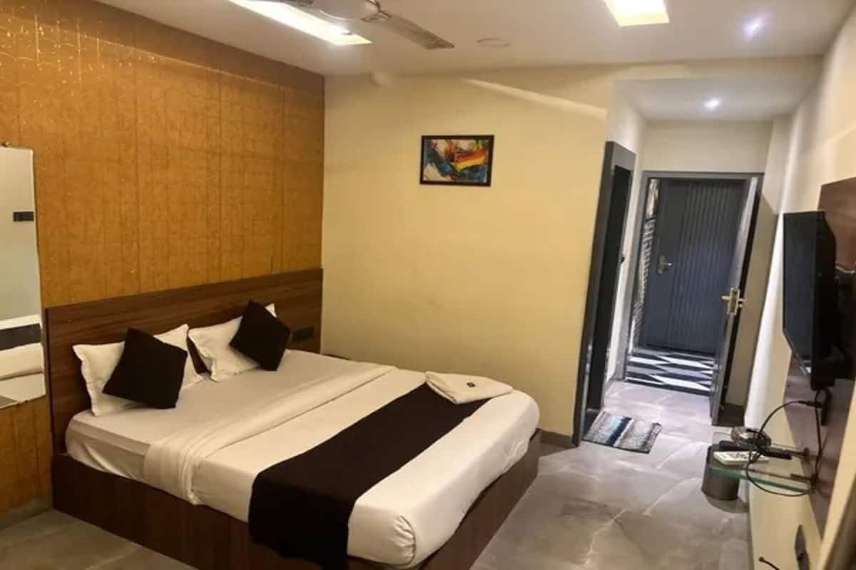尊荣客房 | 埃及棉床单、高档床上用品、客房内保险箱、免费 WiFi