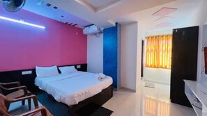 Habitación Deluxe | Sábanas de algodón egipcio y ropa de cama de alta calidad 