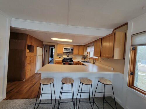 2-bedroom house in Eagle River, view of river, backs up to Trees For Tomorrow
