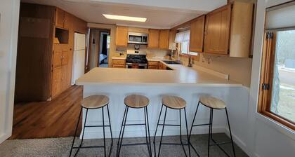 2-bedroom house in Eagle River, view of river, backs up to Trees For Tomorrow