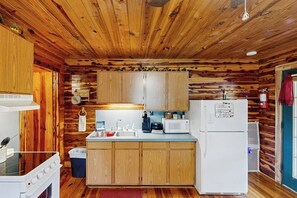 Fridge, microwave, oven, stovetop - Charming riverfront condo with river access for swimming, boating & fishing (Hot Springs)