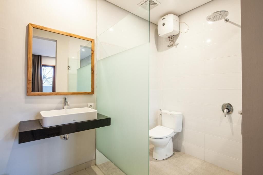 Quarto casal luxo | Banheiro | Chuveiro, secador de cabelo, toalhas de banho, sabonete