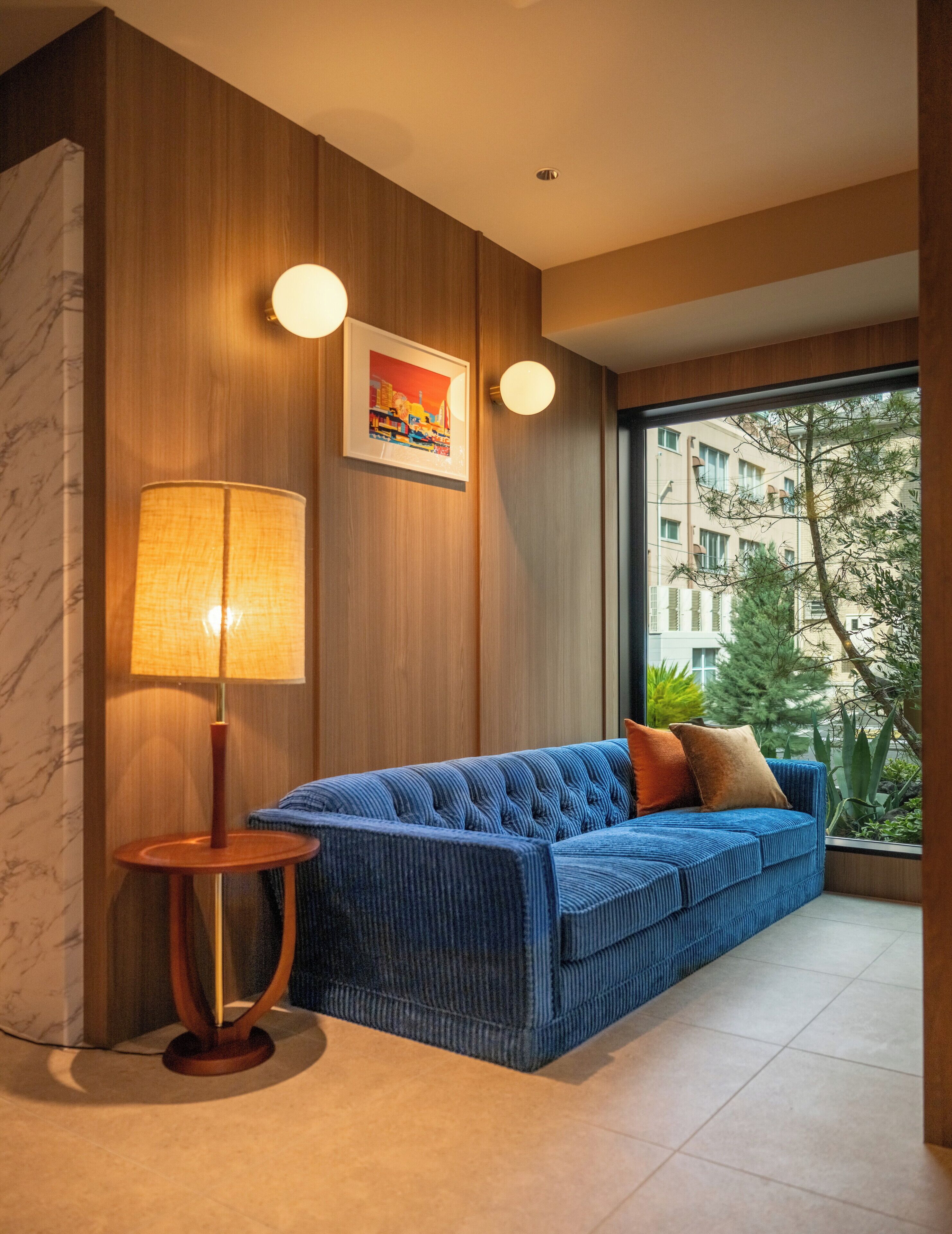 Luxury Triple Room | Living area | 55-inch LCD TV with digital channels