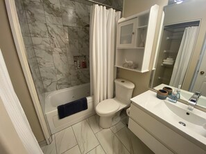 Jetted tub, hair dryer, towels, soap