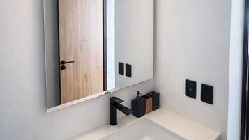 Hair dryer, towels, soap, toilet paper