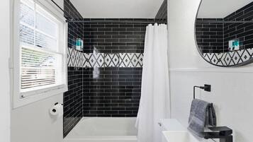 Hair dryer, towels, soap, shampoo