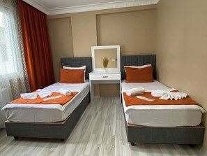 Minibar con artículos gratuitos, wifi gratis y ropa de cama 