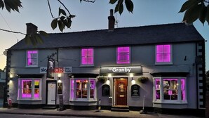 A two-story building with a sign reading 'The Granby.'