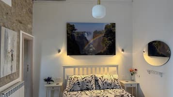1 chambre, fer et planche à repasser, draps fournis