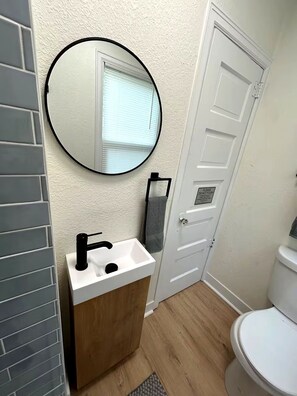 Shower, hair dryer, towels, soap - Modern Tiny Nook ~ 1 BD Walk to River + Fast Wi-Fi (Wichita)