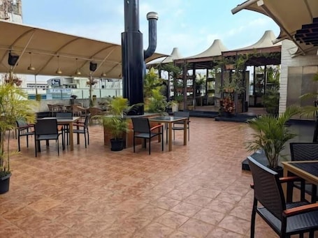 Outdoor dining. Inventree Hotel Bangalore