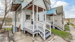 A two-story house with a porch, a staircase, and a front door. - 1 Mi to Erie Canalway Trail! Condo w/ Grill (Little Falls)