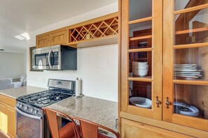 Fridge, microwave, stovetop, cookware/dishes/utensils
