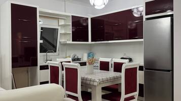 Family Suite, Partial Sea View | Private kitchen | Electric kettle, paper towels