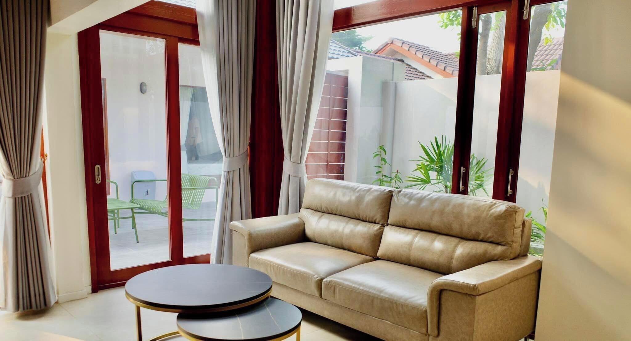 Family Triple Room, 3 Bedrooms | Living area | 32-inch flat-screen TV with cable channels