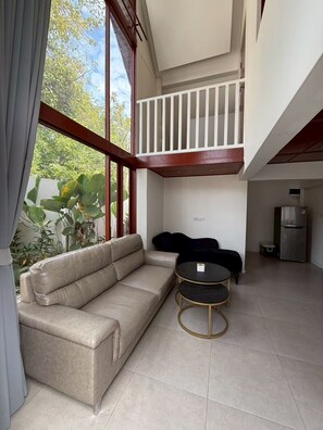 Apartamento superior | Área de estar