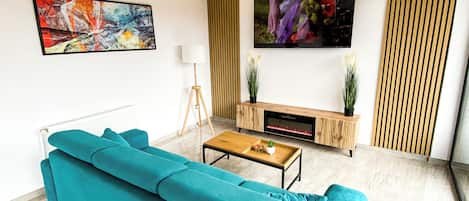 Deluxe Apartment, Garden View | Living area