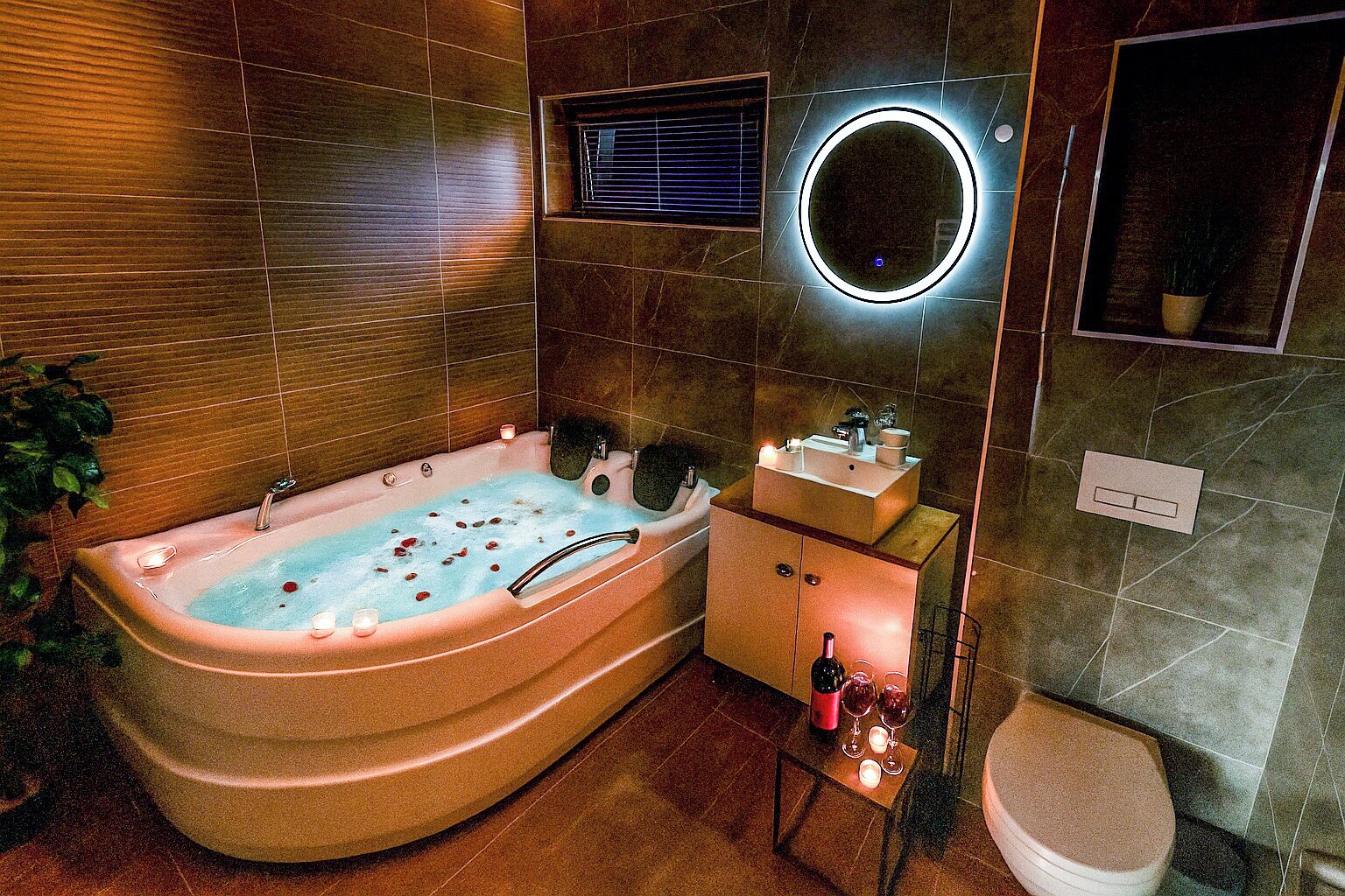 Bathtub, hair dryer, towels, soap