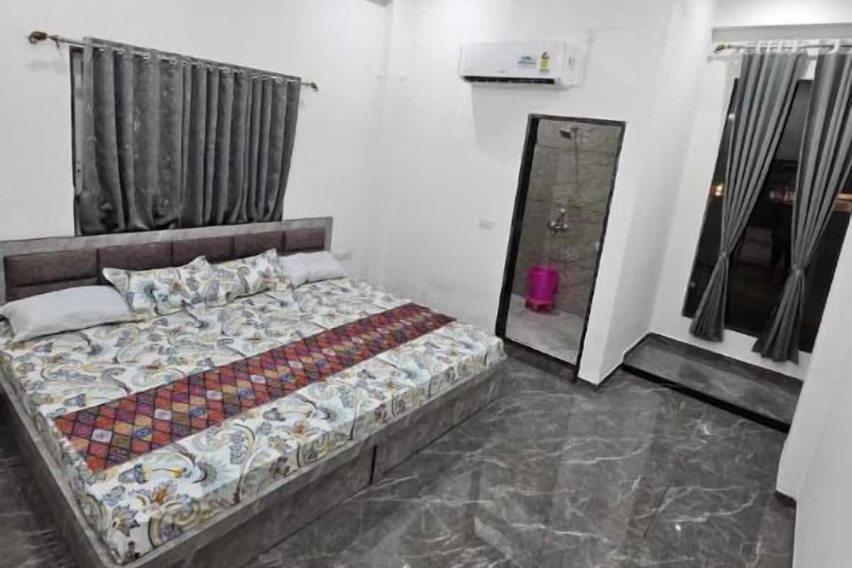 Quarto quádruplo luxo, vista para a cidade