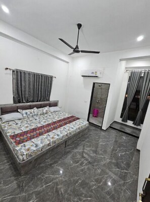 Deluxe Quadruple Room, City View | Desk, free WiFi - Virat palace Khatu Rd (Khatoo)