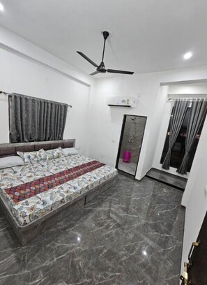 Deluxe fyrbäddsrum - utsikt mot staden