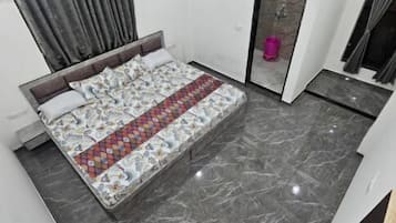 Quarto quádruplo luxo, vista para a cidade | Vista do quarto