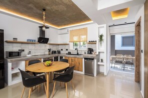 Fridge, microwave, oven, stovetop - ArmoniKon Pool Villas - Villa 1 (Rhodes)