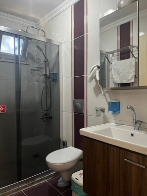 Hair dryer, towels, soap, shampoo