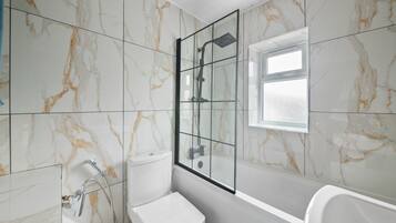 Combined shower/bathtub, deep-soaking bathtub