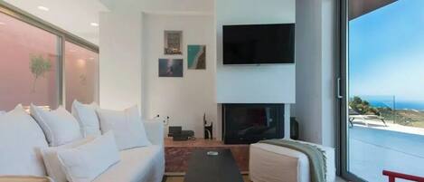 Villa ejecutiva, vista al mar | Área de sala de estar
