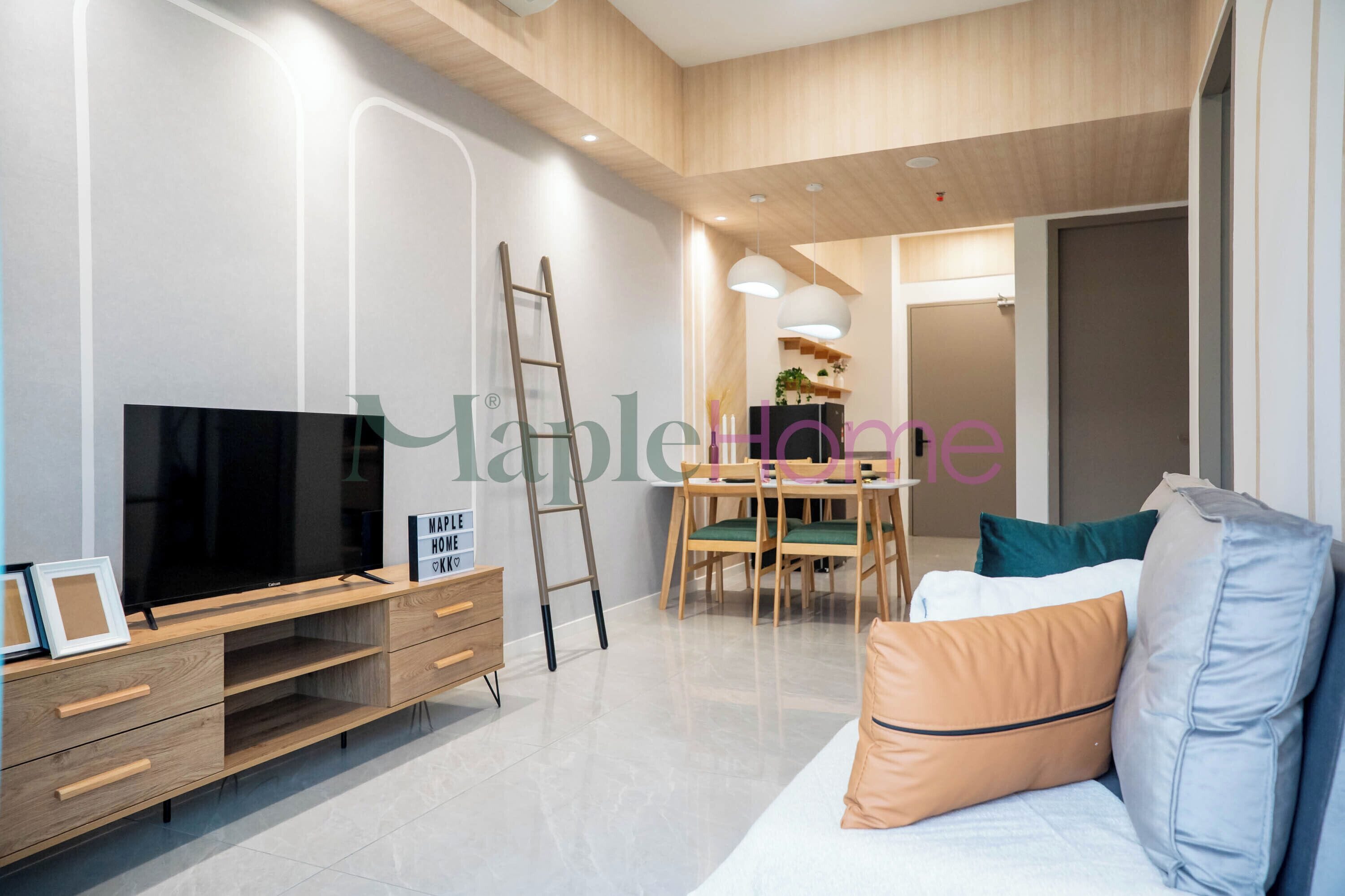 Deluxe Suite, 2 Bedrooms, Non Smoking | Living room | 43-inch Smart TV with digital channels