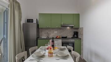 Family Apartment, 1 Bedroom, Balcony (Wabi Sabi Apt3 Pool & Sea View) | Dining room
