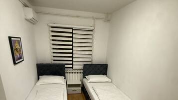 3 slaapkamers, een strijkplank/strijkijzer, gratis wifi, beddengoed