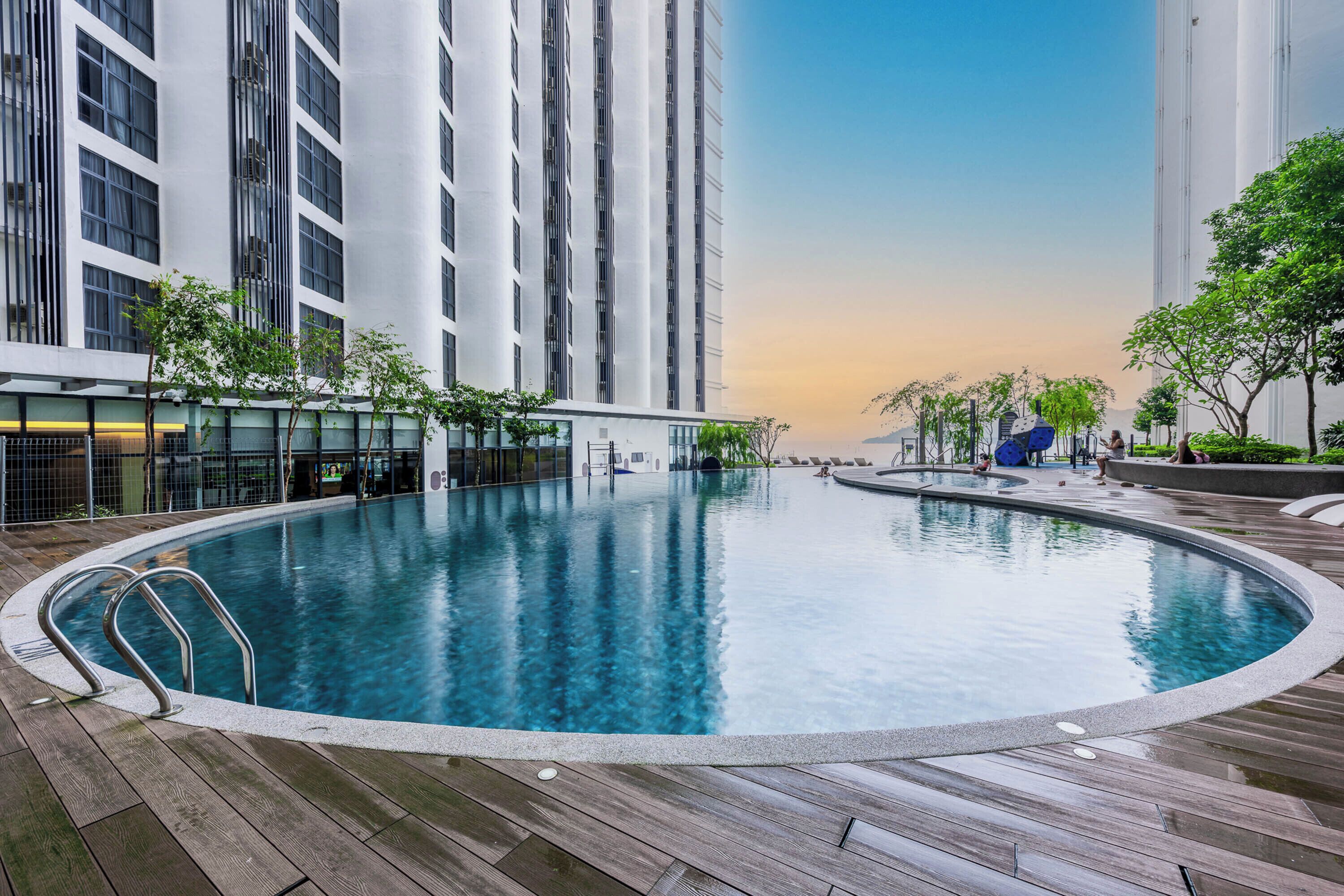 Outdoor pool, open 7:00 AM to 10:00 PM, pool loungers
