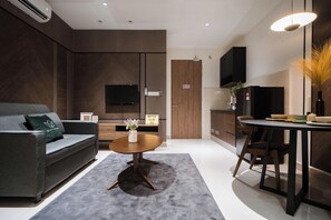 Premier Suite, 1 Bedroom, City View | Living area | 43-inch flat-screen TV with cable channels - The Shore Premier Suites Kota Kinabalu (Kota Kinabalu)